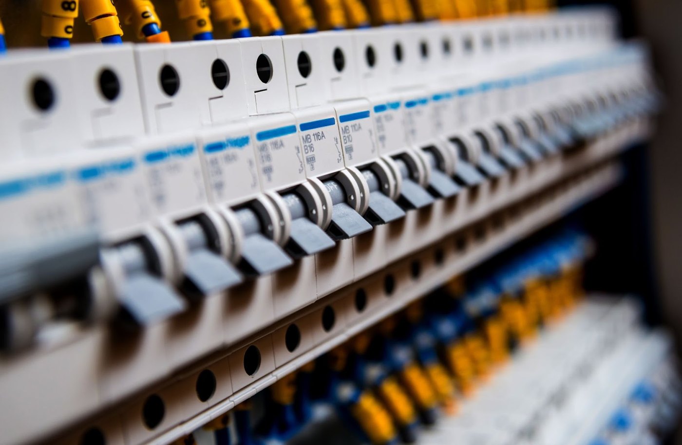 A row of circuit breakers in a switchboard